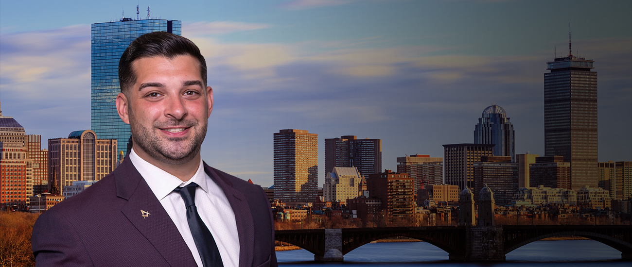 Matthew M. Foti with Boston skyline in the background