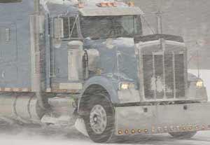 Truck driving in the snow